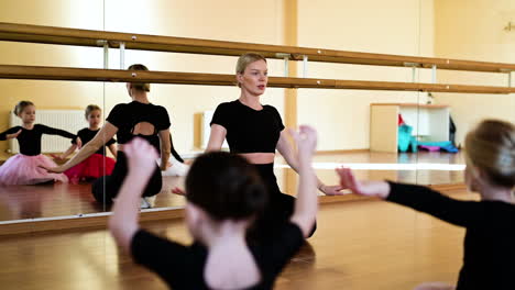 Teacher-and-pupils-in-dance-classic-class