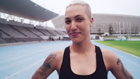 young athlete standing alone at the track