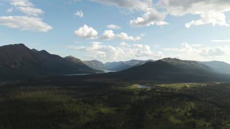 Aerial-footage-of-beautiful-forest-wilderness-with-mountains-rivers-and-lakes