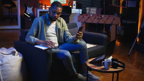 vertical video african american teleworker calling coworker on video conference to take notes