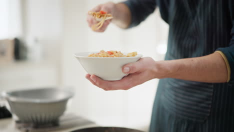 sharing a bowl of pasta