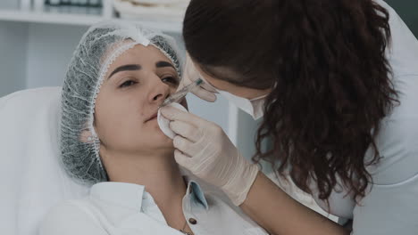 lip augmentation procedure in a beauty clinic