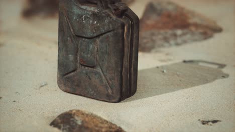 old rusty fuel canister in the desert