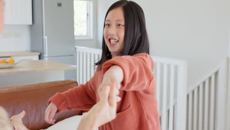 asian mother, hug and child in house