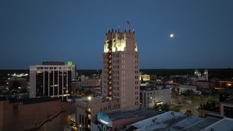 Jackson,-Michigan-downtown-at-night-with-drone-video-close-up-circle