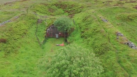 Drone-view-of-Peak-District-National-Park-surrounded-with-greenery-in-England