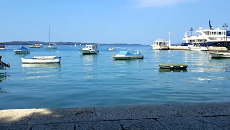 boats swinging on the waves at the pier