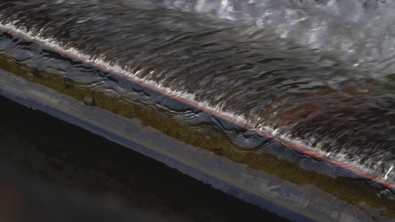 Water Flows Through The Upper Part Of The Weir Ridge Cascading Down