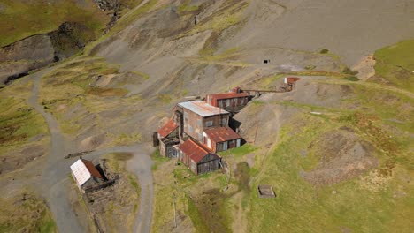 abandoned mine and derelict buildings with reveal of surroundings at force crag mine coledale beck in the english lake district