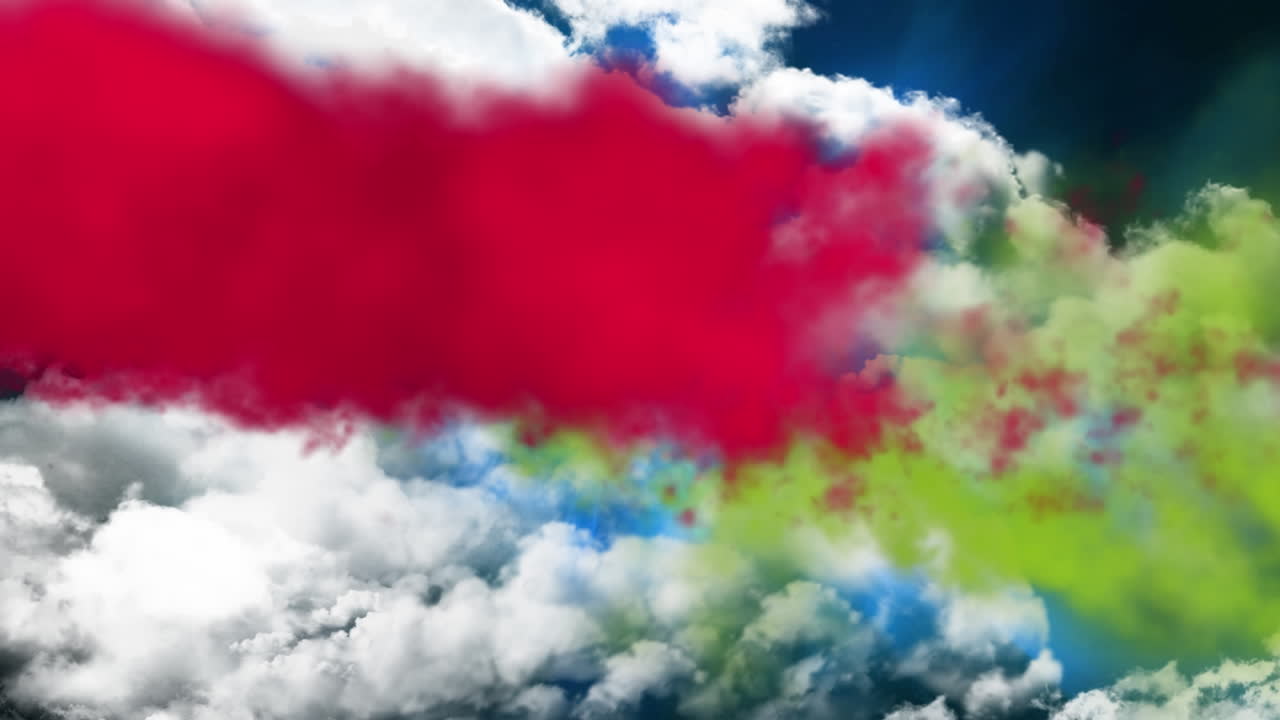 하늘에 녹색과 빨간색 연기가 있습니다.