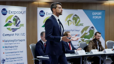 a speaker presenting at an export forum conference