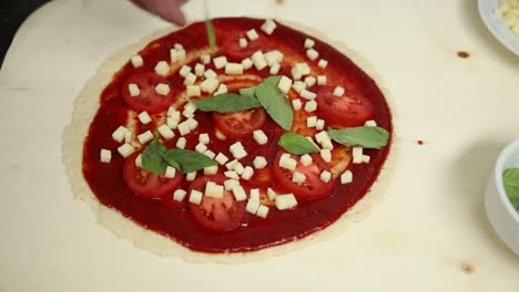 preparing a homemade pizza