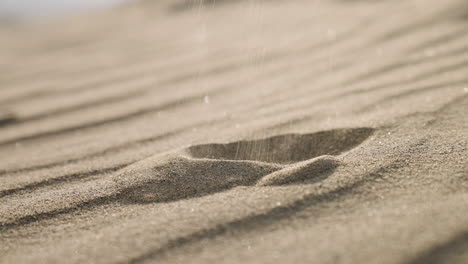 Close-Up-Of-A-Human-Hand-Grabbing-Sand-Dune-In-Death-Valley-Desert-In-Eastern-California,-USA