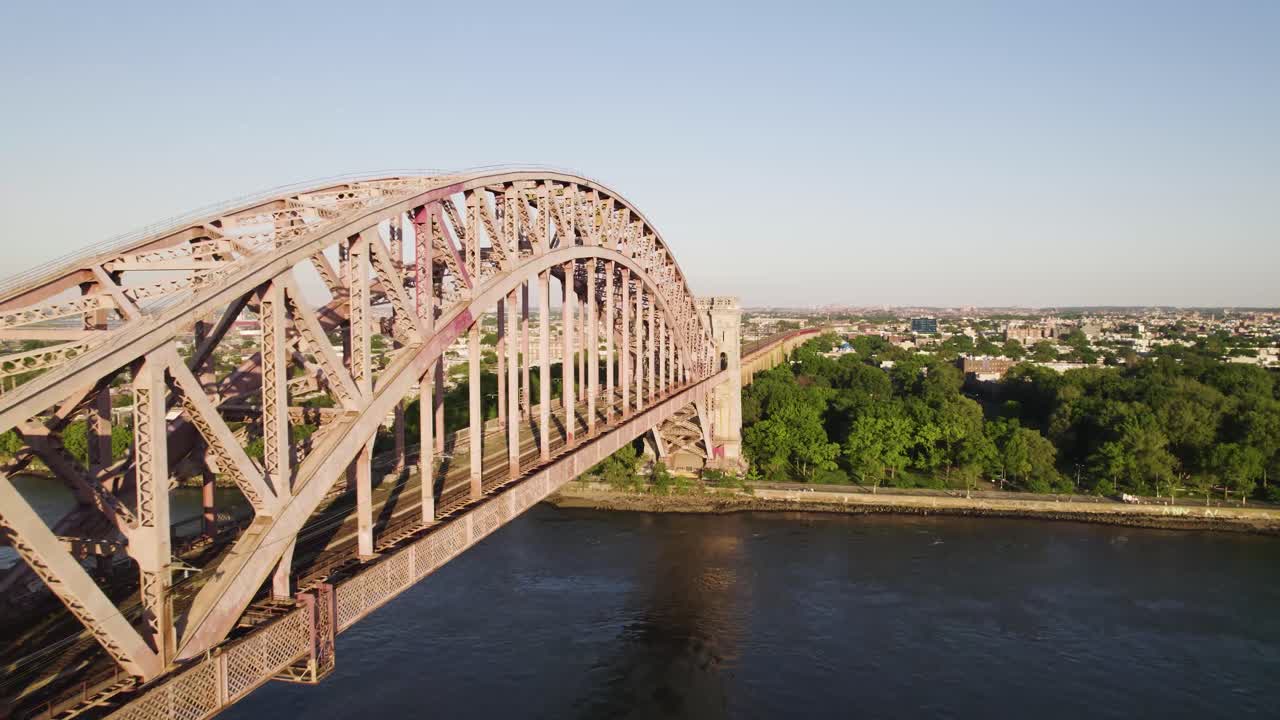 Drone shot of old iron train bridge connecting Manhattan and Queens, New York