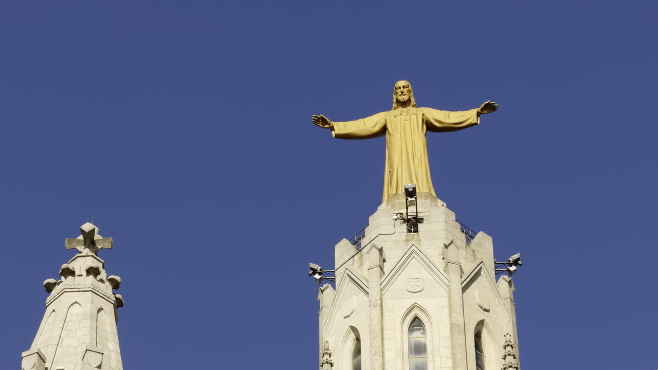 Statue of Jesus Christ atop a church tower