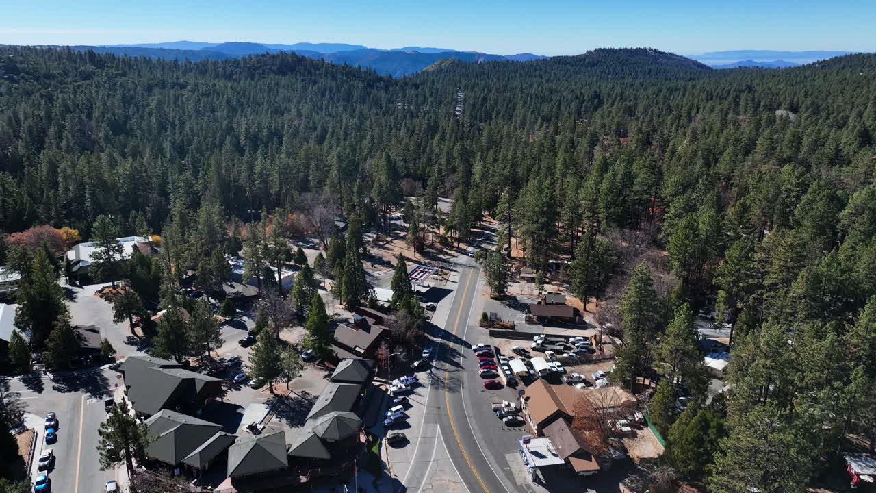 Drone flyover the Idyllwild village, sunny day in Riverside, California, USA