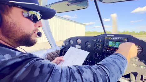 preflight checklist gone through by private pilot aboard a piper cherokee 180