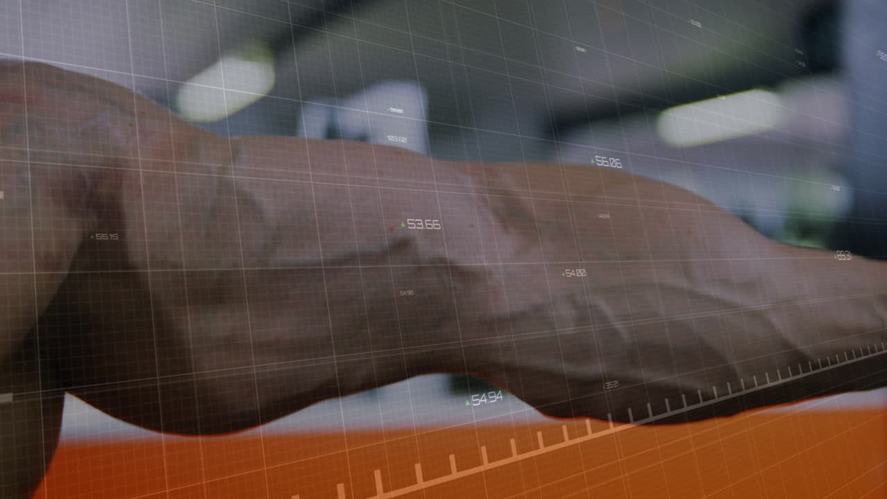 Camera focusing on extended arm, man flexing biceps in gym while HUD over torso, measuring strength