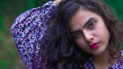 Close-up-shot-of-a-beautiful-brunette-girl-with-a-nose-pin---Portrait-shot-of-a-beautiful-brown-girl