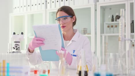 female scientist analyzing data in a laboratory