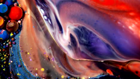 abstract colorful acrylic and food paint bubbles on water