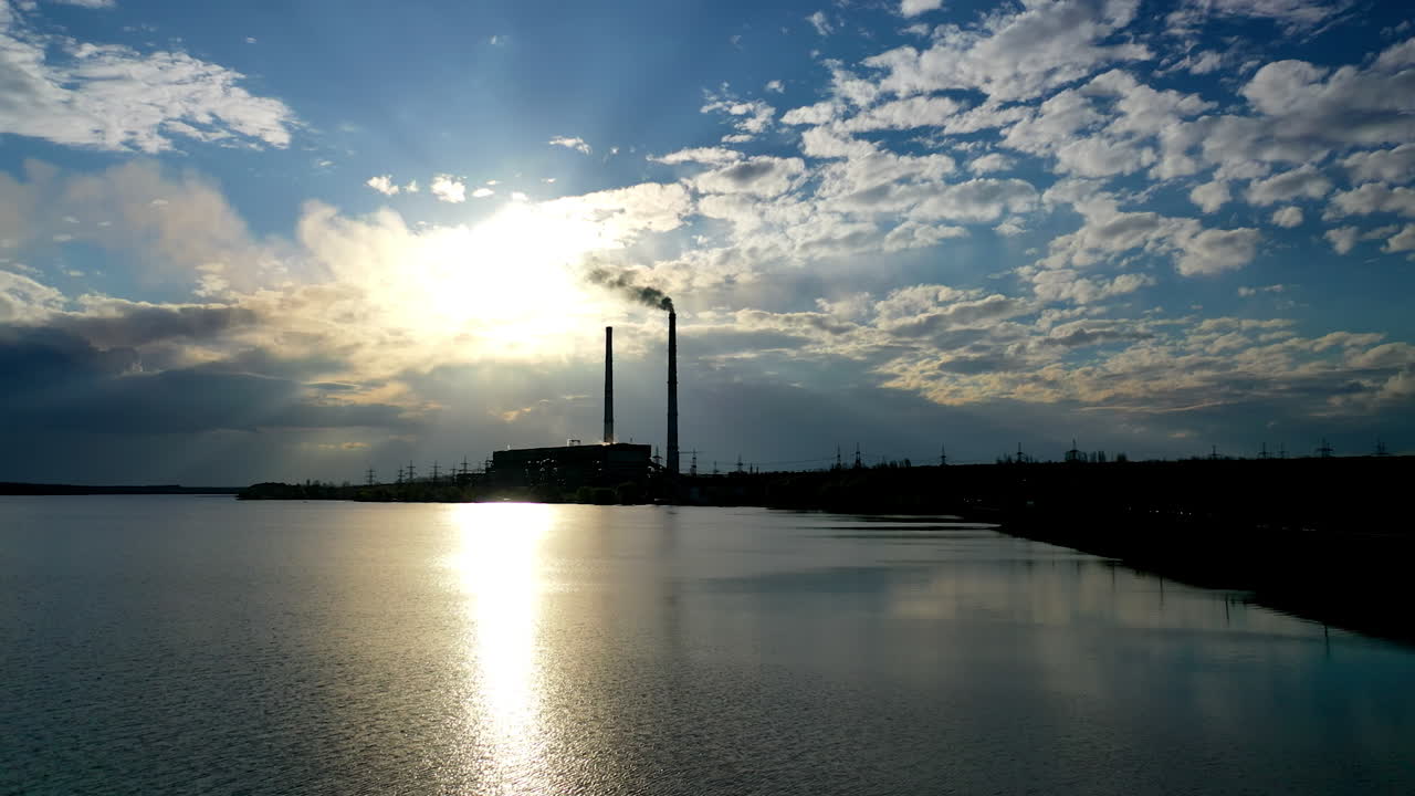 Aerial view of factory shadow. Industrial shadow on the sunset.