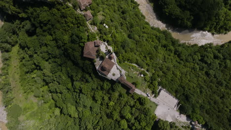 Whirling-down-shot-of-medieval-monastery-shrouded-in-mysterious-legends