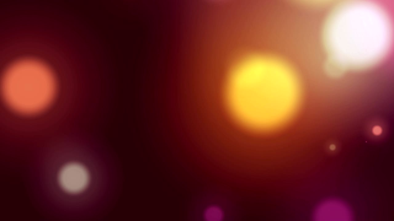 animación de puntos de luz brillantes multicolores que se mueven en movimiento hipnótico en el fondo