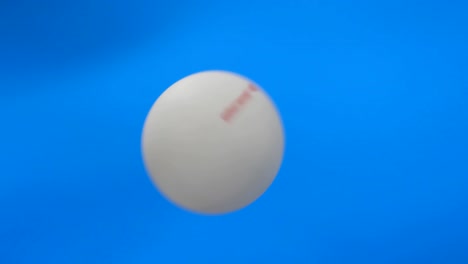 ball spinning against blue background