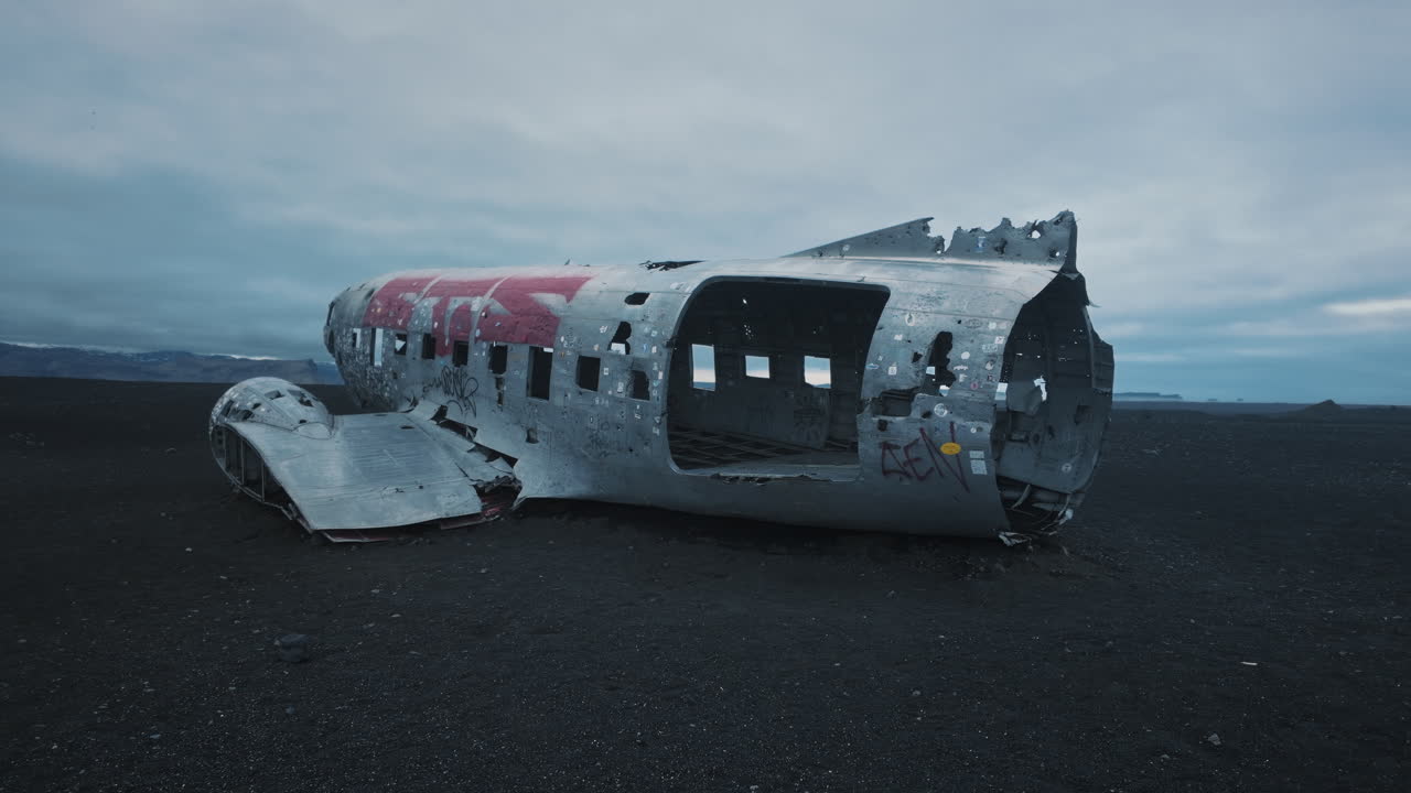 Abandoned Airplane Wreckage on Iceland's Black Sand Beach