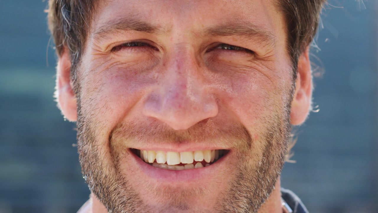 Close-up Portrait of a Smiling Man Outdoors