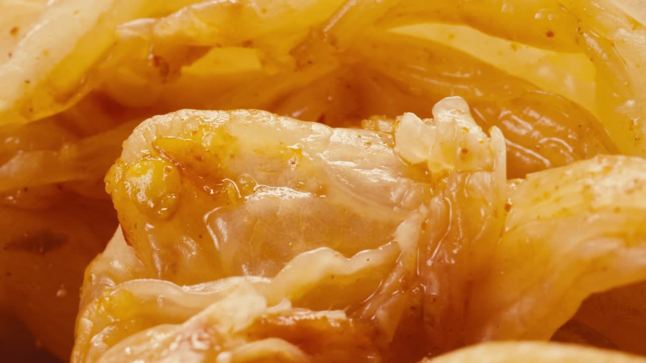 Close-up of texture fermented spicy cabbage kimchi with in can. Preservation of vegetables in glass jars. Fermentation preserved kimchi cabbage with spices macro. Asian cuisine.