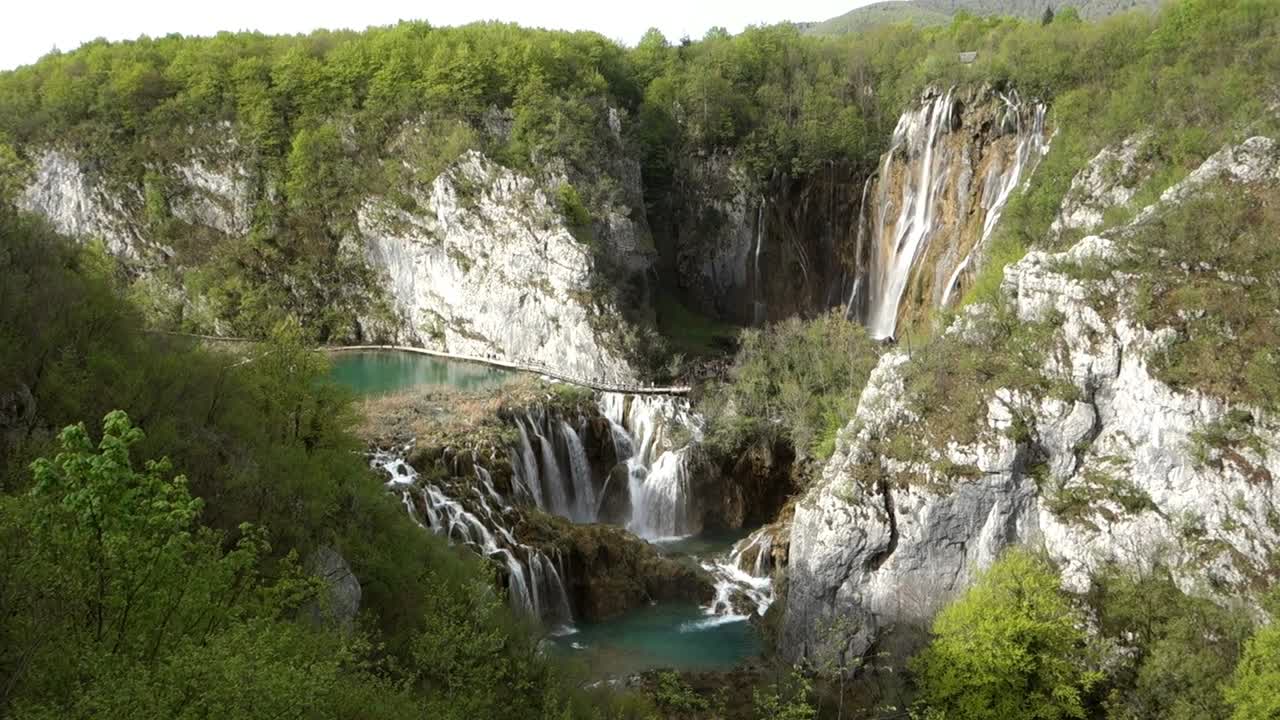 wide upper view of amazing cascades at Plitvice Lakes National Park. spectacular waterfalls, lakes and flora in Croatia