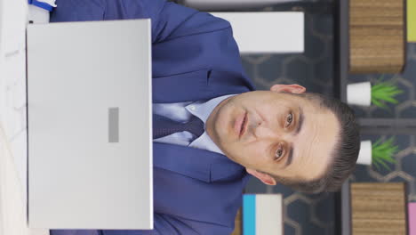Vertical-video-of-Bored-unhappy-businessman.