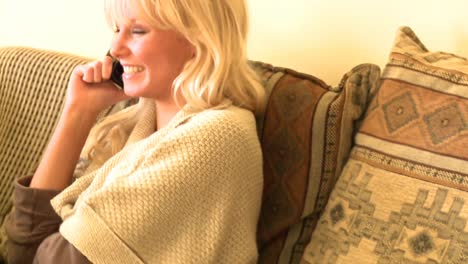 animated woman talking on phone sitting on sofa