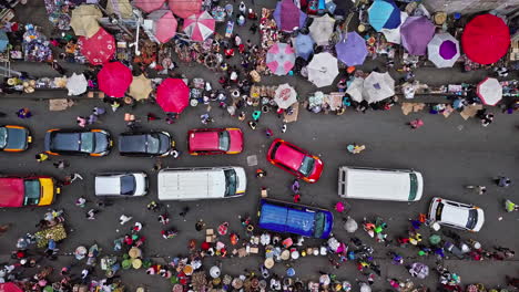 crowd of people and cars at accra central market