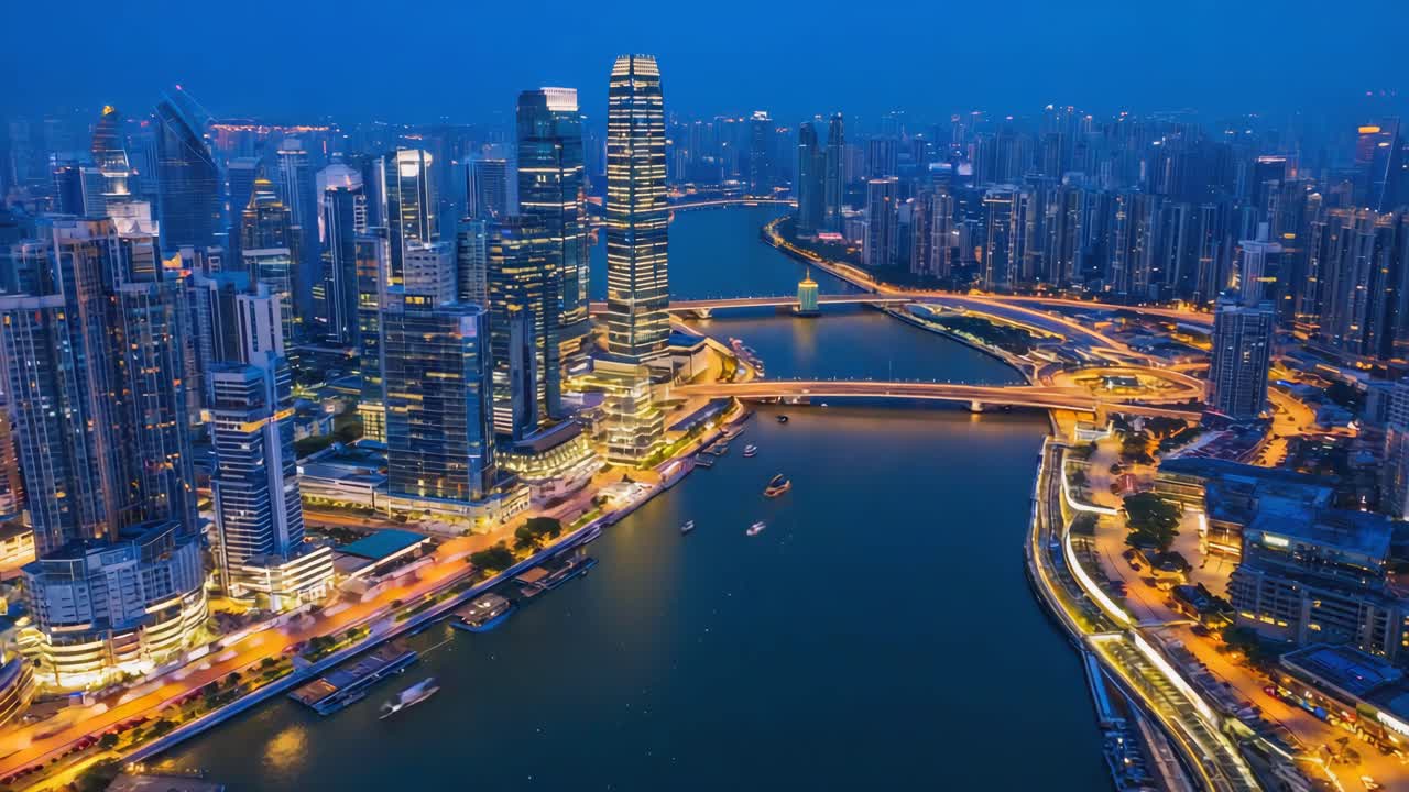 Nighttime Cityscape with Illuminated Skyscrapers and River
