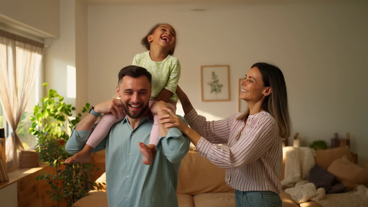 Happy Family Playing and Laughing Together at Home