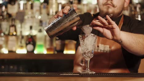 bartender preparing a cocktail