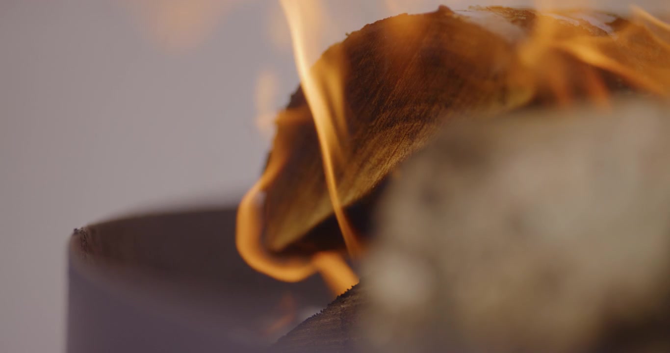 Close-up of Warm Flames Burning on Wood Logs