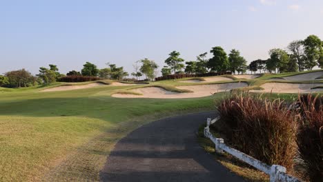 a serene walk through a green landscaped park