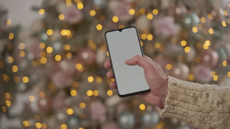 hands using a white screen phone