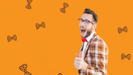 Animation-of-happy-caucasian-man-over-orange-background-with-falling-bow-ties