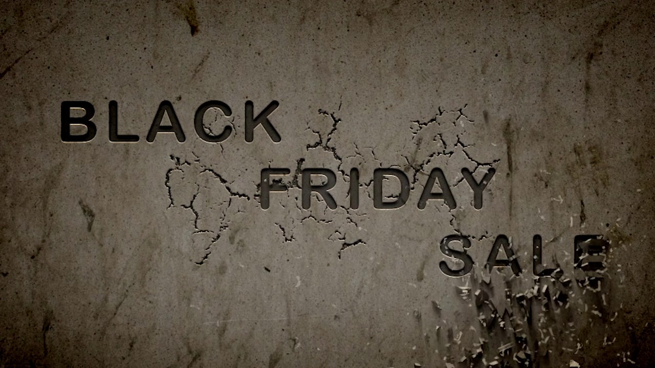 Black Friday sale. The animated image depicts a message projected onto a crumbling brick wall, with exploding text. The wall’s texture appears worn, with bricks cracked and weathered over time.