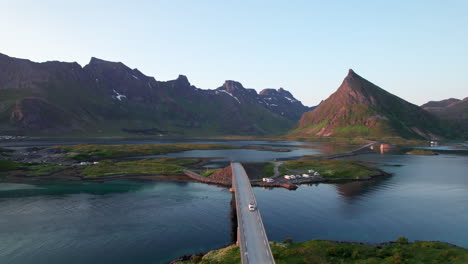 Camper-van-driving-over-the-Iconic-bridges-to-Fredvang-on-Lofoten-Island-during-summer