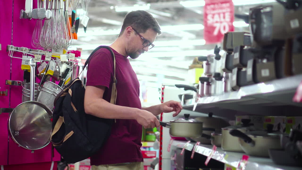Man shopping for kitchenware