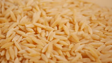 close up of a pile of orzo pasta