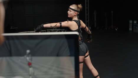 dancing woman wearing motion capture suit in studio ballet dancer girl wearing mo-cap suit for 3d character animation for virtual reality technology