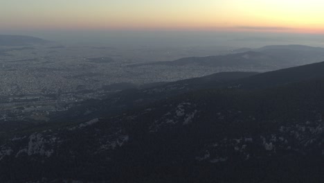 aerial - panoramic view of athens, greece from mount parnitha at dusk