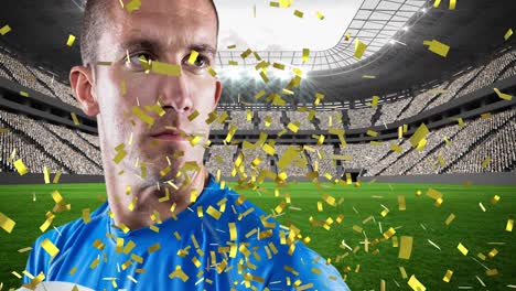 golden confetti falling over caucasian male rugby player holding a rugby ball against sports stadium